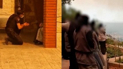   Policía se arrodilló para convencer a monja que abandonara convento cercado por incendios en Grecia 